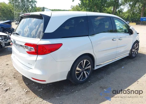 2020 Honda Odyssey Elite z USA, uszkodzony, nr VIN 5FNRL6H99LB058215